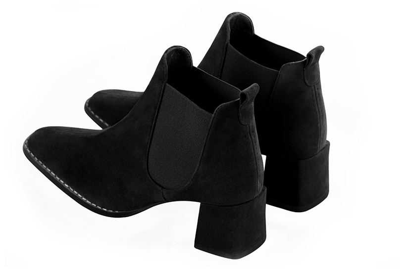Matt black women's ankle boots, with elastics. Square toe. Medium block heels. Rear view - Florence KOOIJMAN